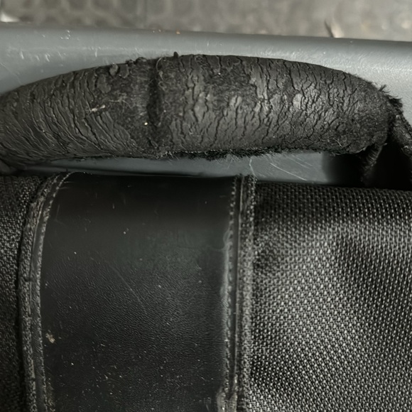 Used Tumi fabric computer bag. The handle has been worn. all the zippers work. - Picture 2 of 5